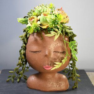 Serene, peaceful airbrushed Sola wood succulents in a fun fabulous face planter